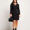 Vestito svasato con pattine bordate